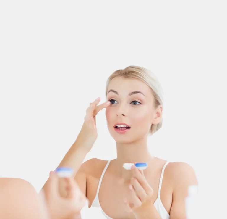 Patient putting in a contact lens